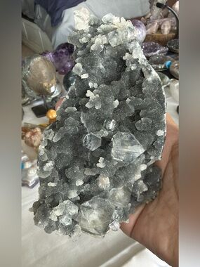 Large darker in color blue chalcedony with apophyllite accents.